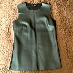 Black top made by Generation love, front is lather, back is ribbed fabric